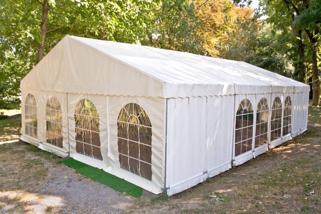 marquee in wooded area